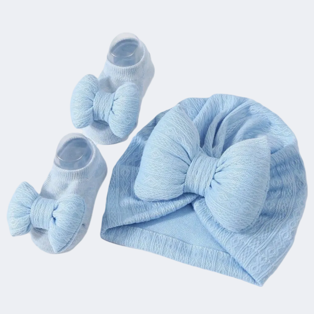 Blue baby hat and booties set with a large bow