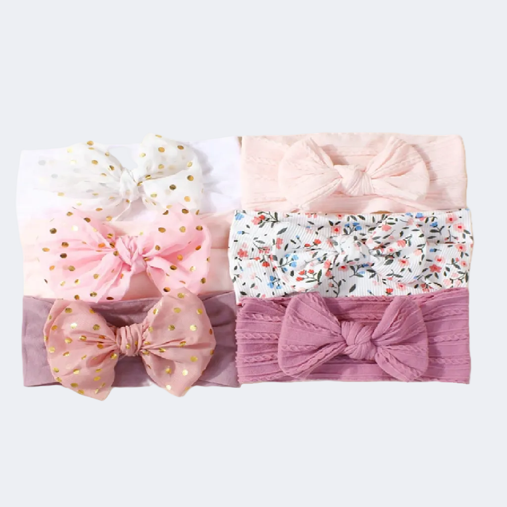 Set of four baby headbands with bow designs