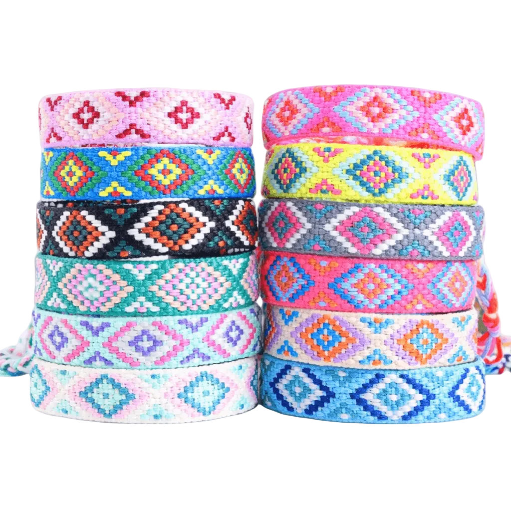 Stacks of colorful patterned bracelets on a white background