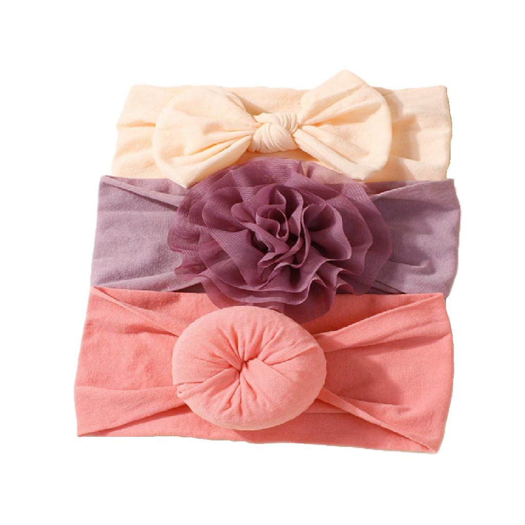 Set of three headbands with a bow, flower, and round design