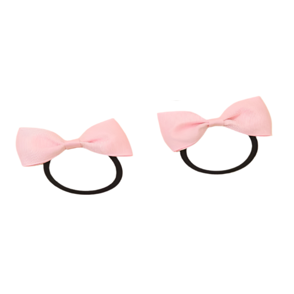 Two pink bow hair ties on a white background