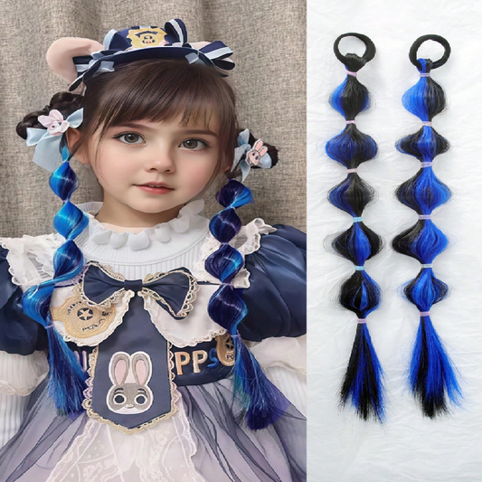 Child wearing a costume with blue and black braided hair extensions on a plain background