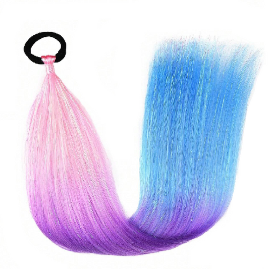 Gradient hair extensions in pink, blue, and purple with a black clip on a white background