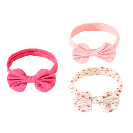 Three colorful headbands with bow designs