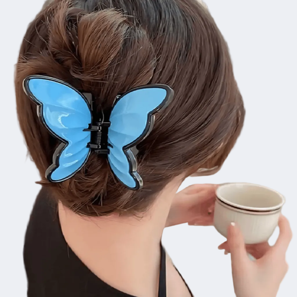 Person with a blue butterfly hair clip