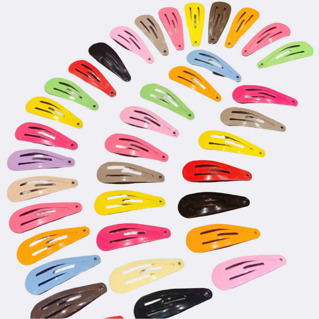 A collection of colorful hair clips in various shades arranged neatly on a surface.