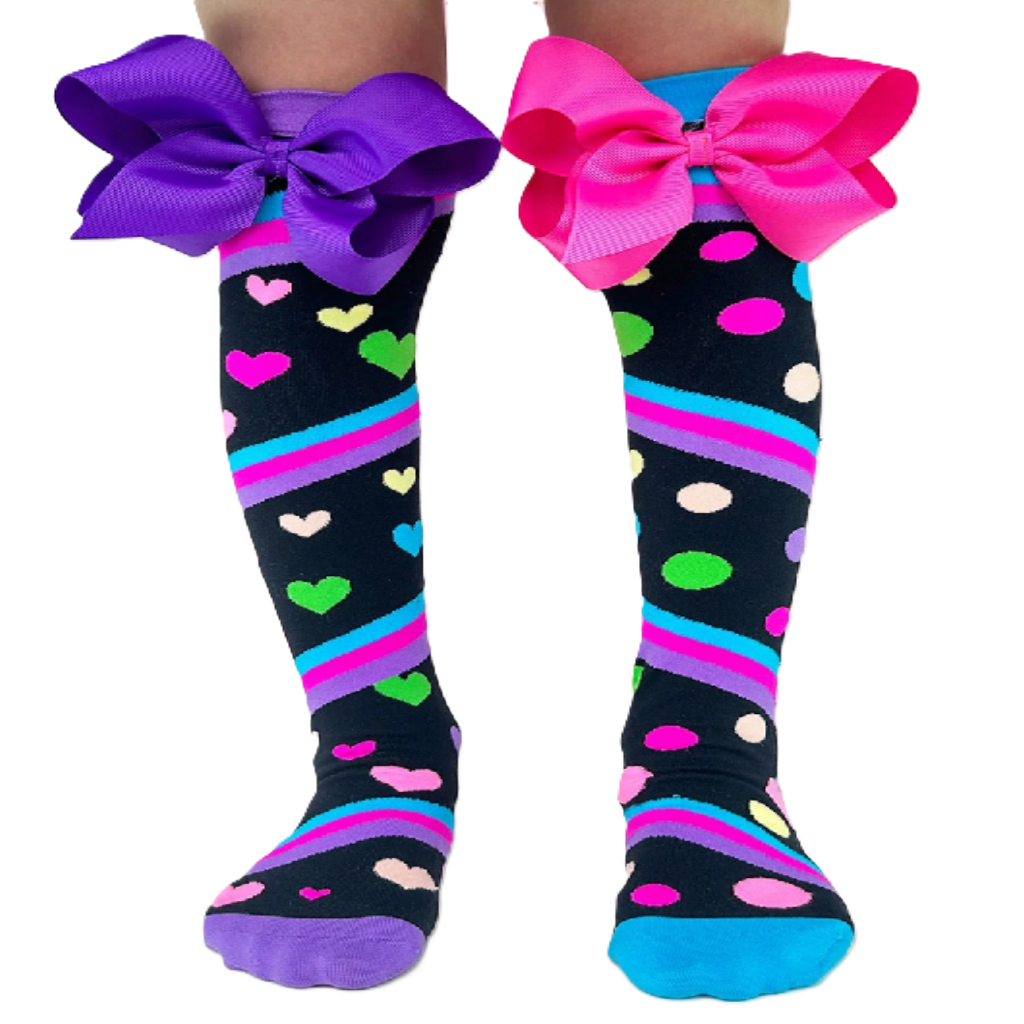 Knee-high socks with colorful bows on a white background