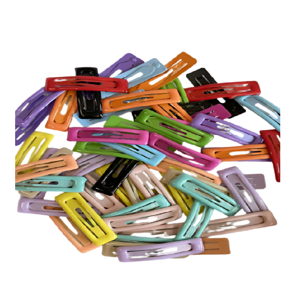 Assorted colorful hair clips on a white background