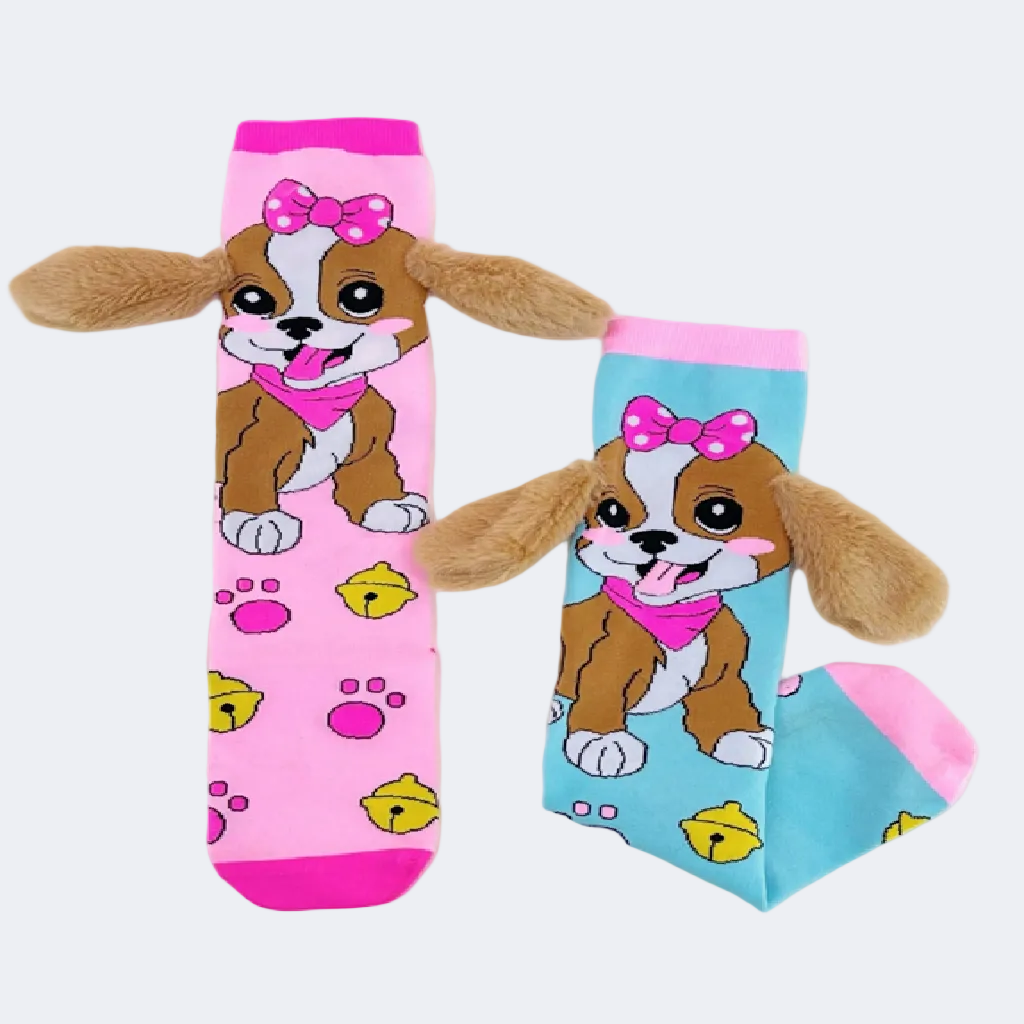 Two cartoon dog socks with pink and blue designs
