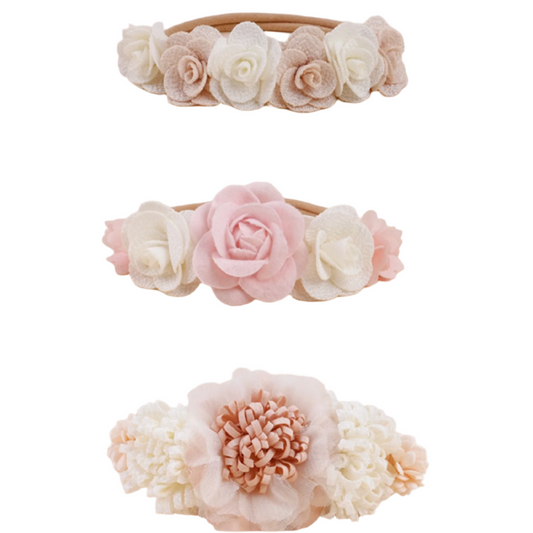 Three floral headbands in different colors
