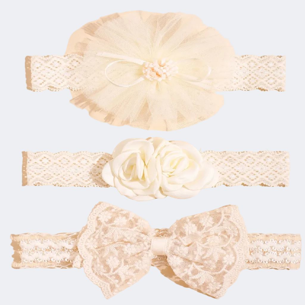 Set of lace headbands with floral and bow designs on a beige background
