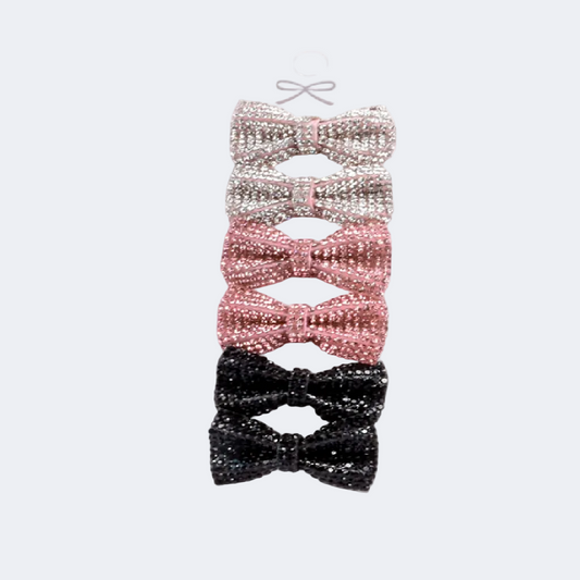 Set of three decorative bows in black, pink, and silver