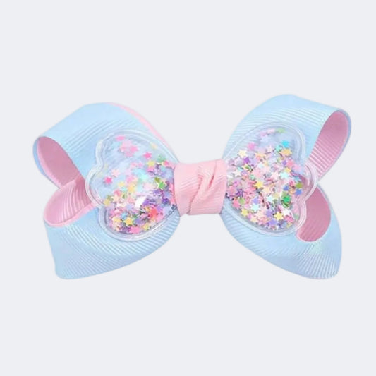 Light blue and pink hair bow with colorful confetti