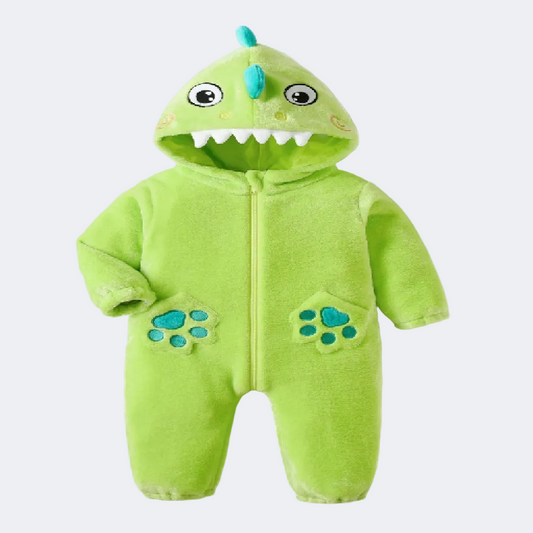 Green baby onesie with dinosaur design on a white background