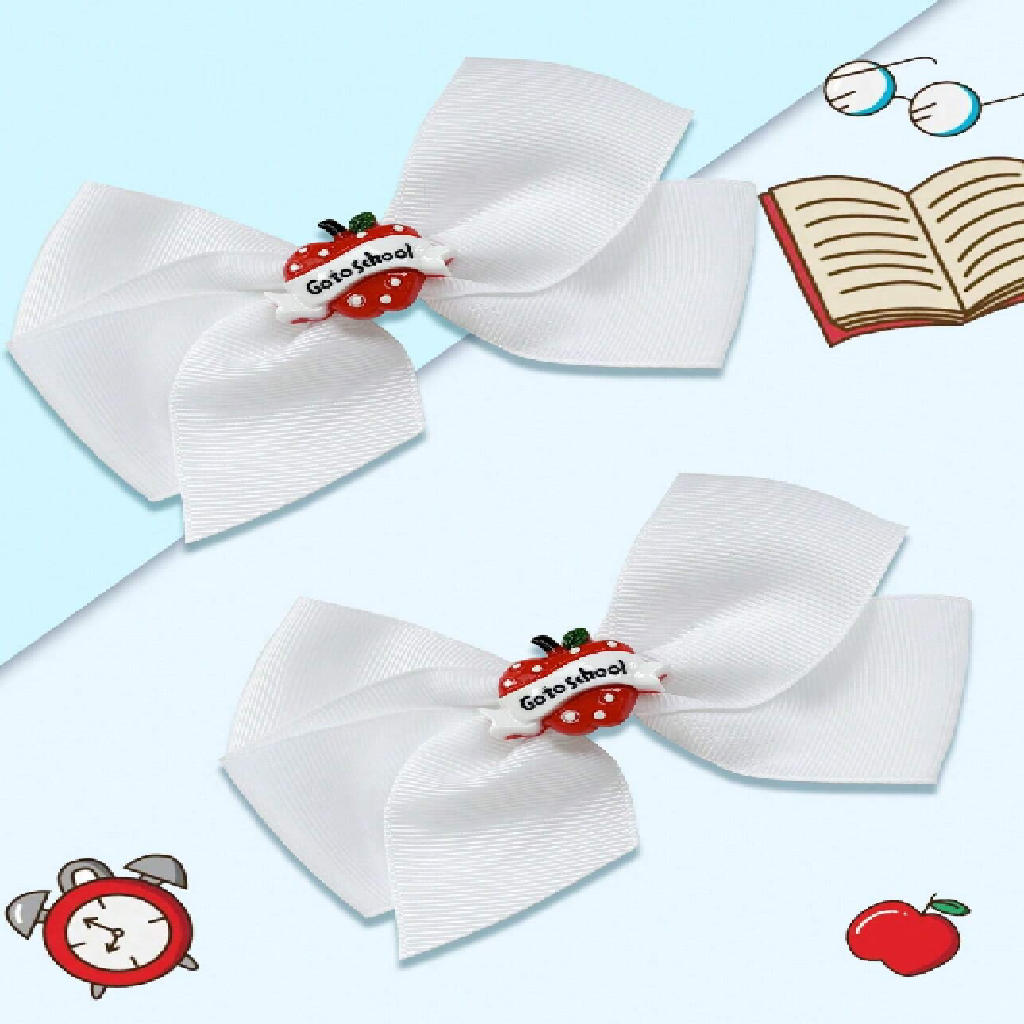 White hair bows with red apple and 'Go to school' text on a light blue background