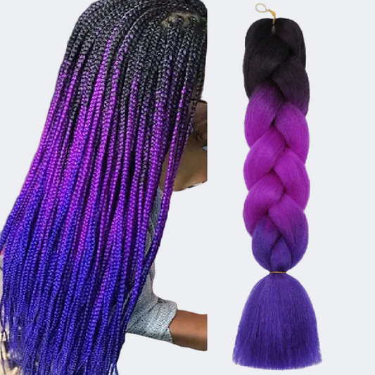 Purple and black braided hair extensions held by a person.