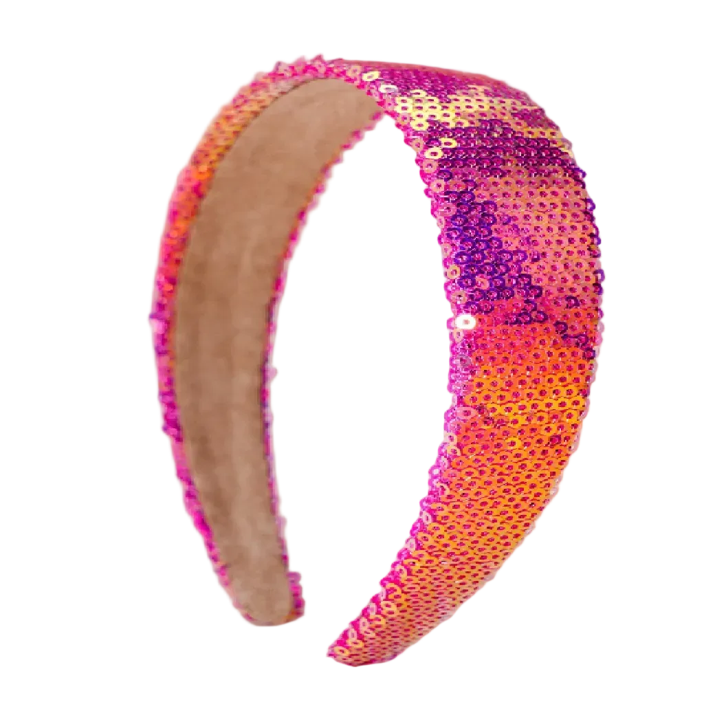 Sequined headband with pink and orange gradient on a beige background