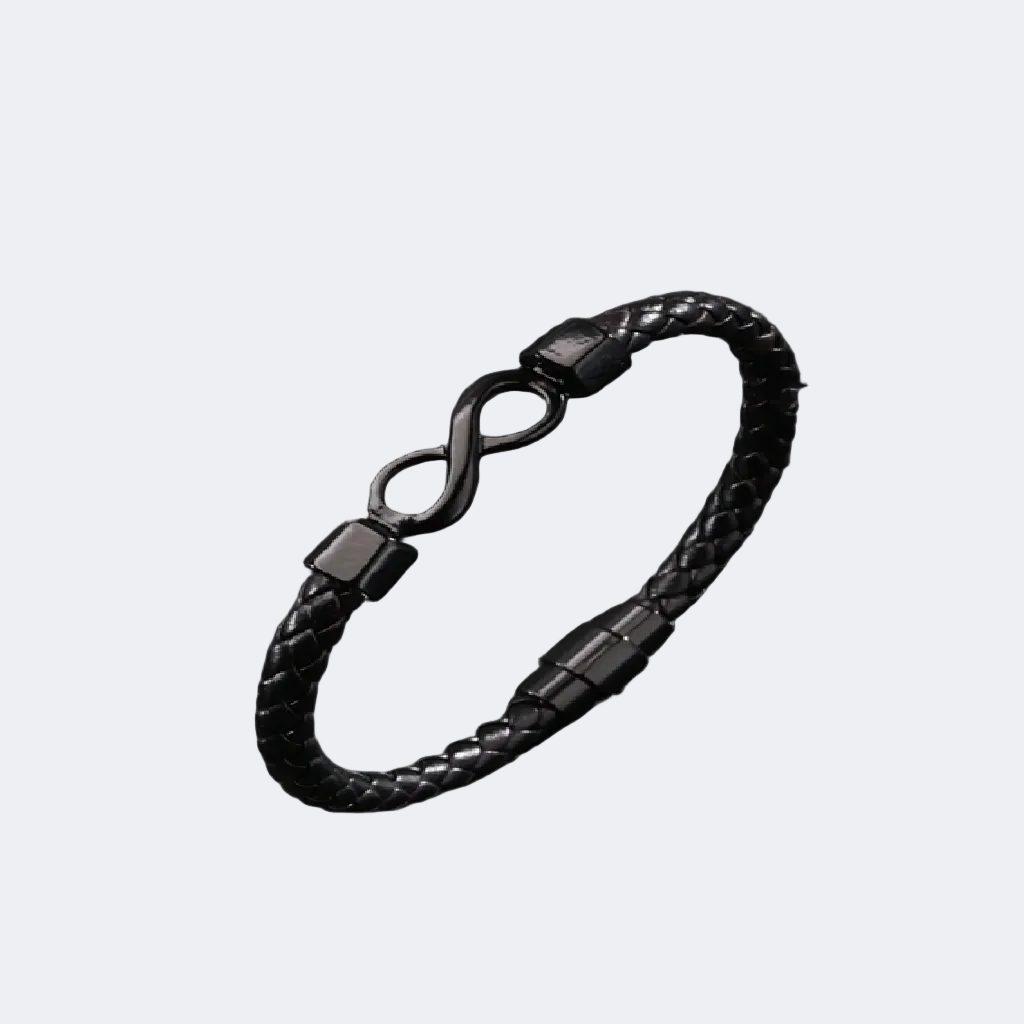 Black braided bracelet with an infinity symbol on a dark textured background