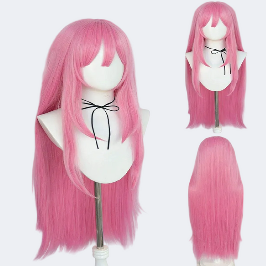 Pink wig on a mannequin head with a white background