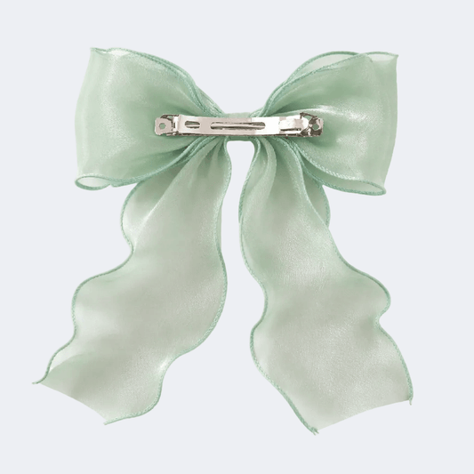 Light green bow on a white background