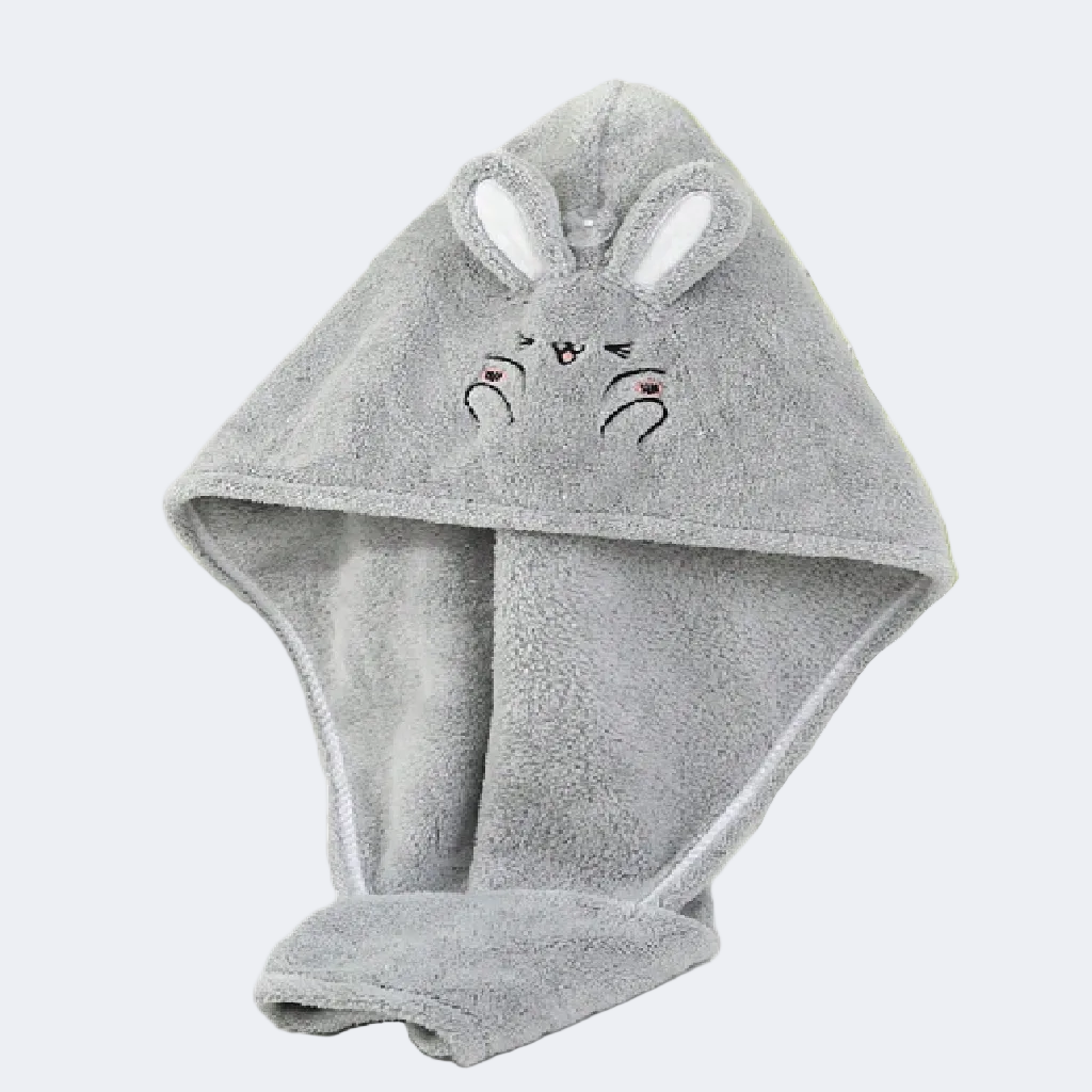 Gray hooded towel with bunny ears and face on a white background