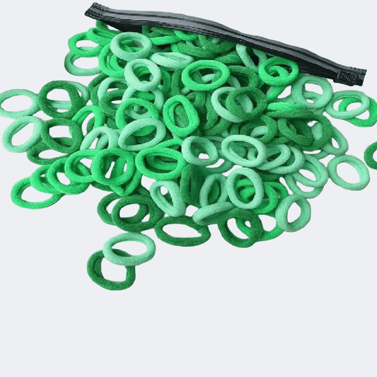 Bag of green hair ties on a white background