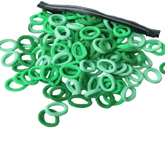 Bag of green hair ties on a white background