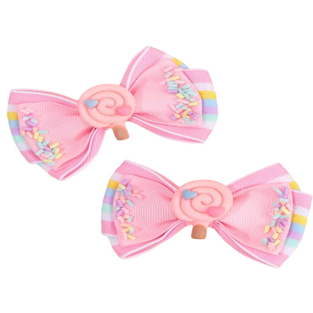 Two pink hair bows with colorful sprinkles