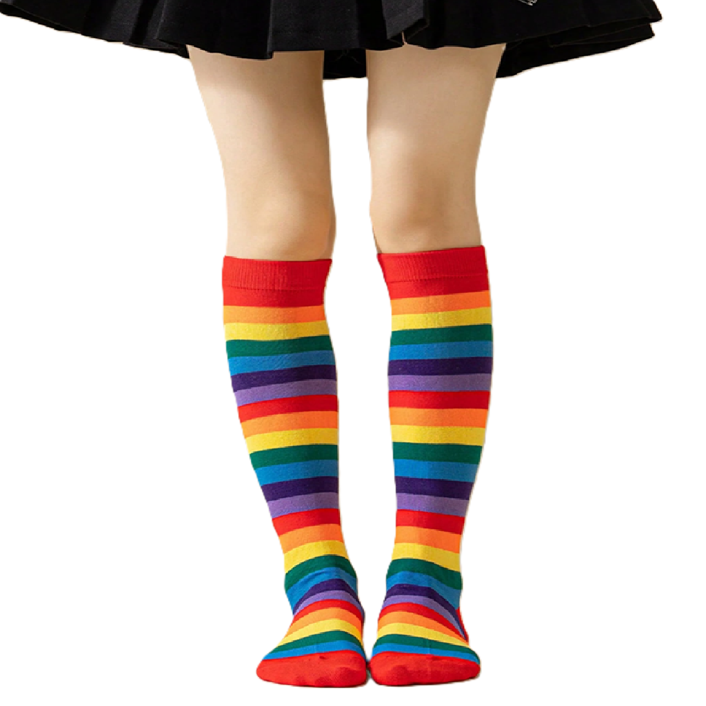 Rainbow striped knee-high socks worn with a black skirt