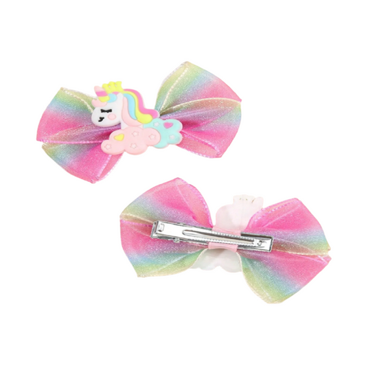 Two colorful hair bows with a unicorn design