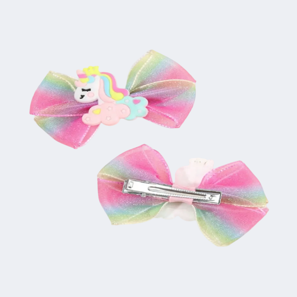 Two colorful hair bows with a unicorn design