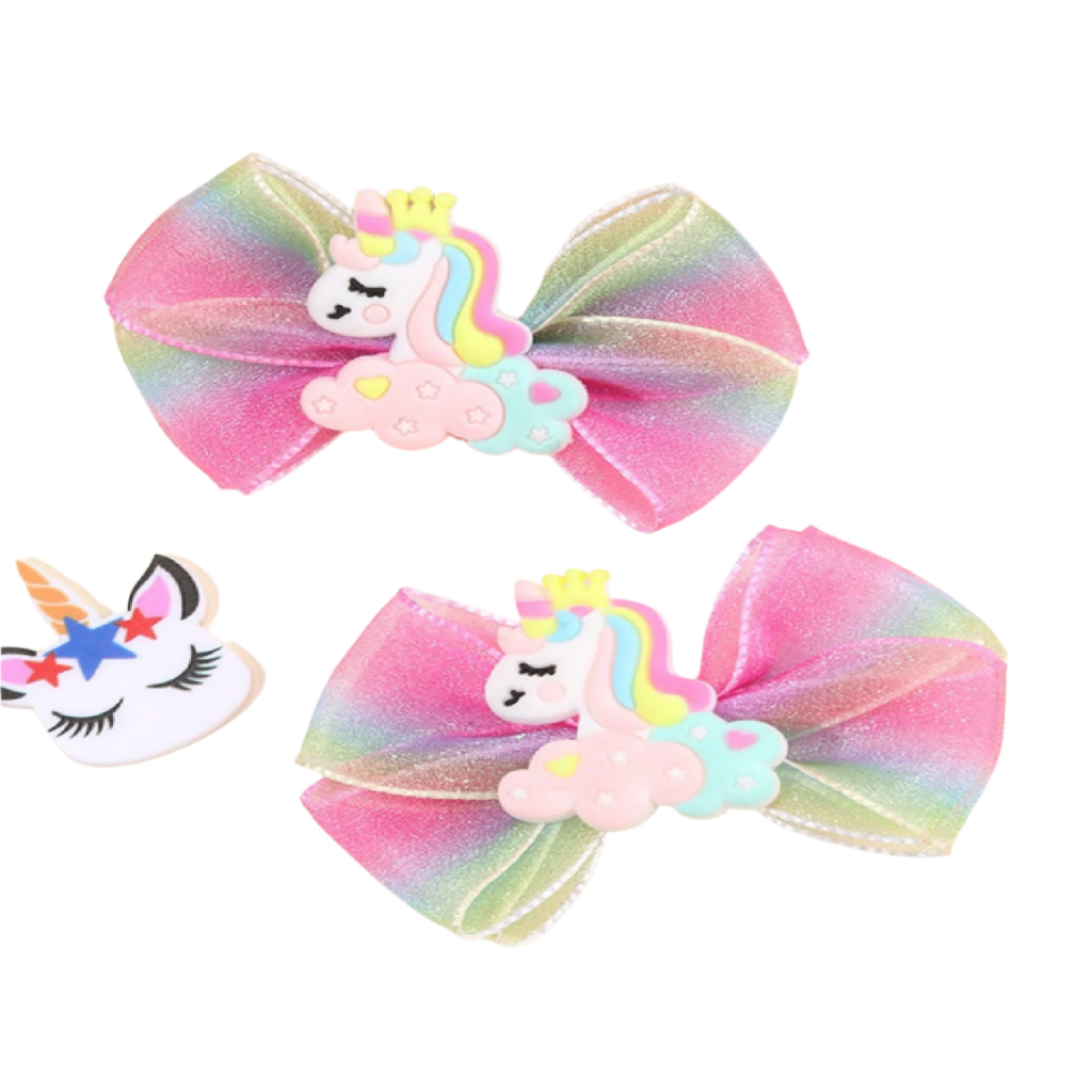Two colorful hair bows with unicorn designs