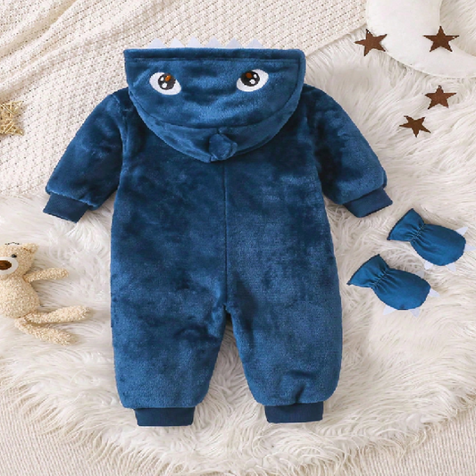 Blue baby onesie with hood and matching booties on a textured white surface.