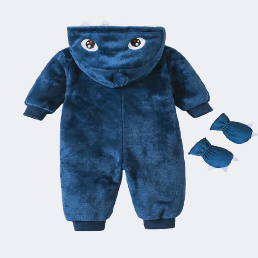 Blue baby onesie with hood and matching booties on a textured white surface.