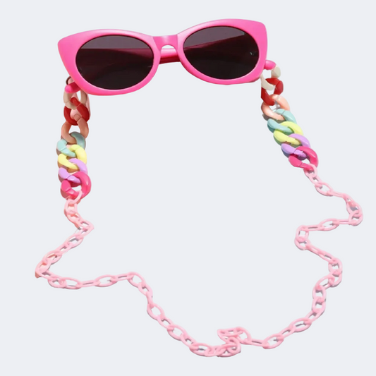 Pink sunglasses with a colorful braided chain on a white background