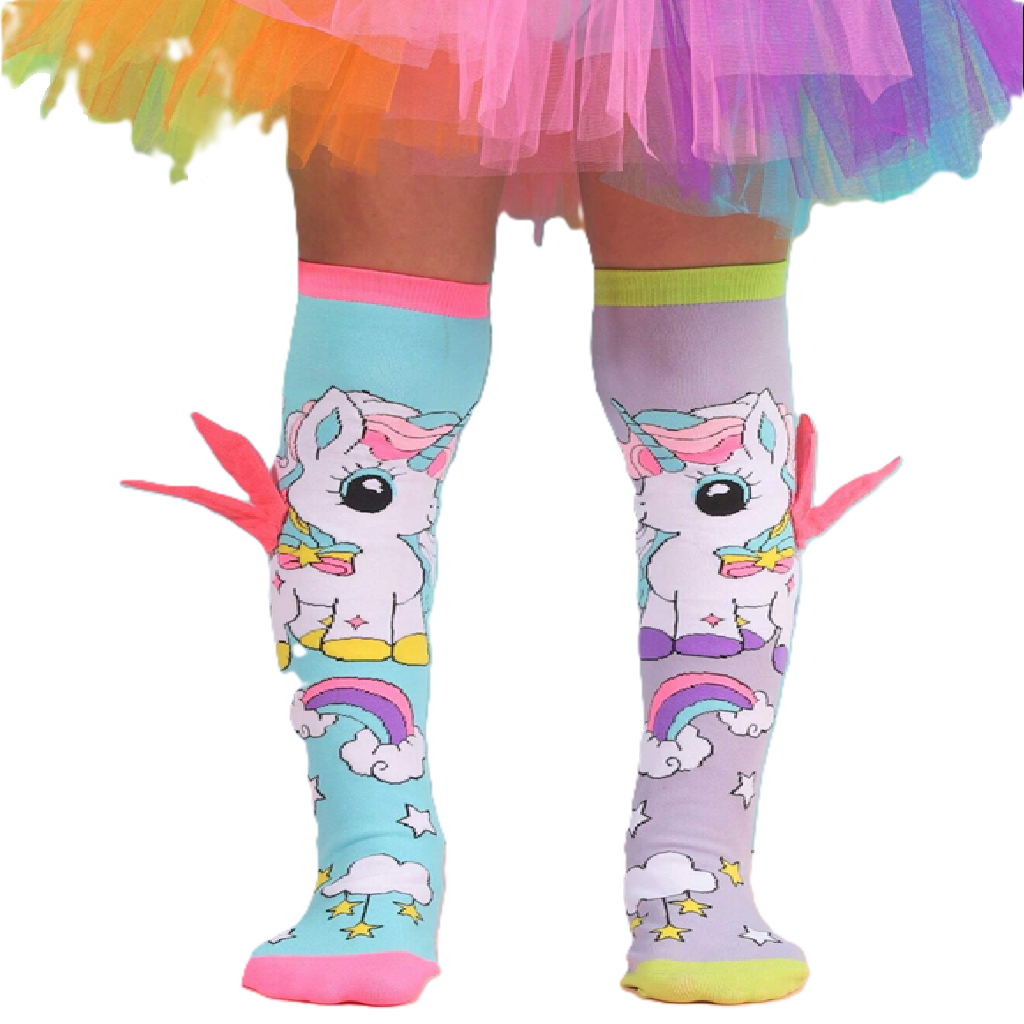 Colorful knee-high socks with unicorn design worn with a rainbow skirt.