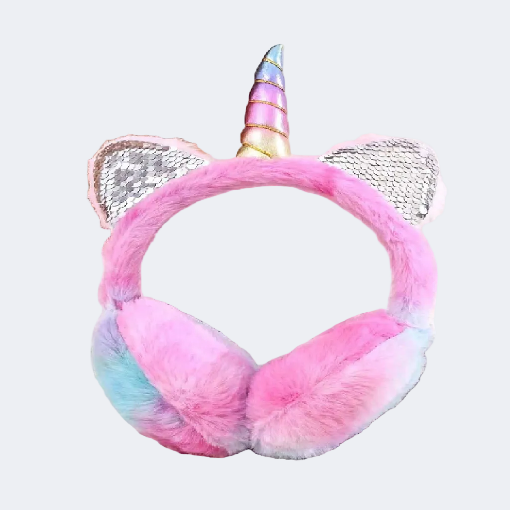 Unicorn-themed pink and blue ear muffs on a textured surface.