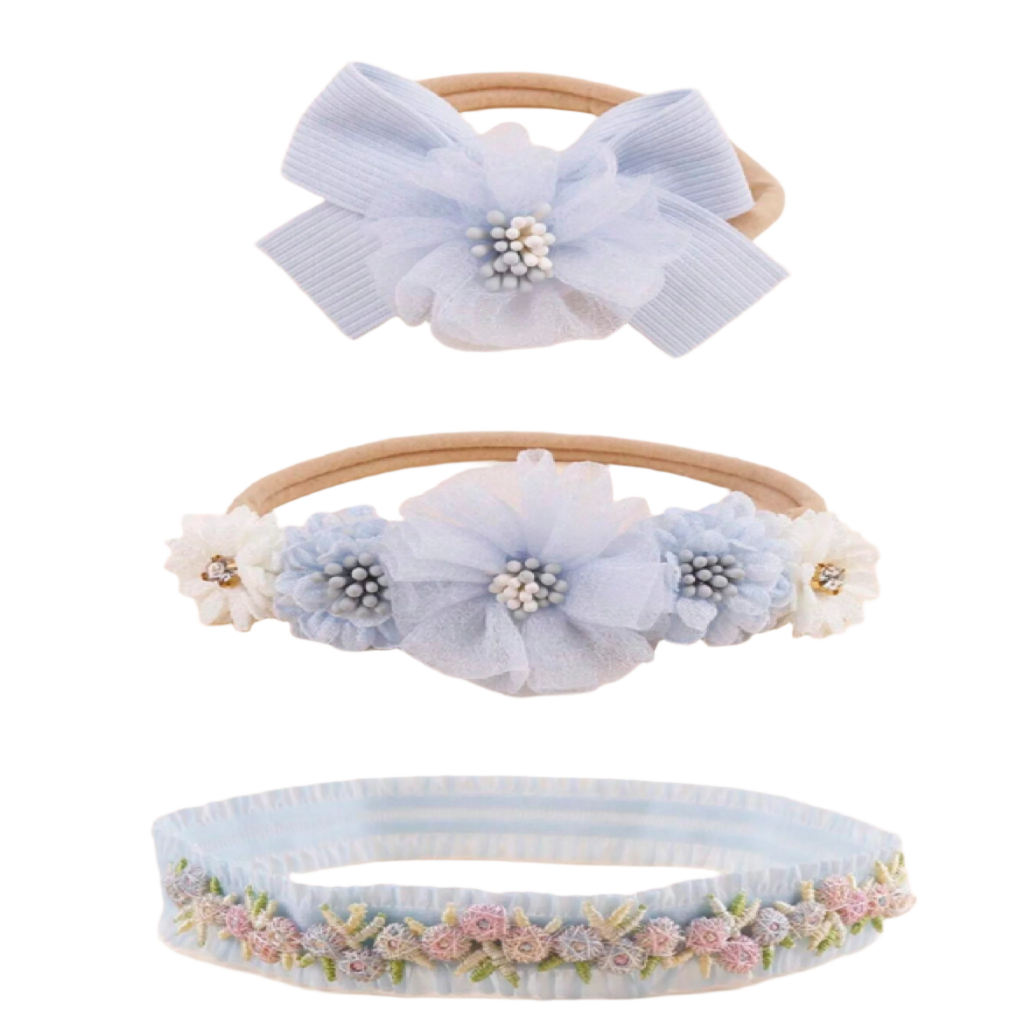 Three decorative headbands with floral and bow designs