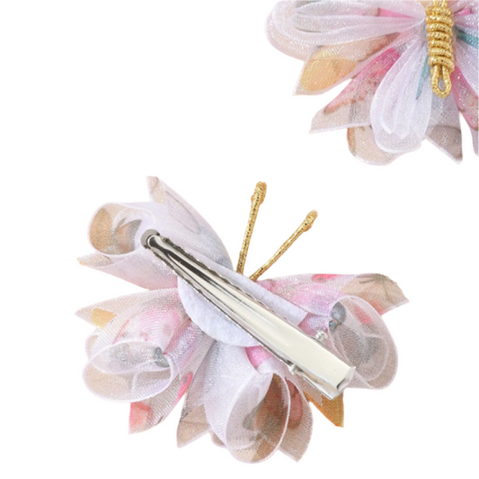 Butterfly-shaped pen holder with a pen