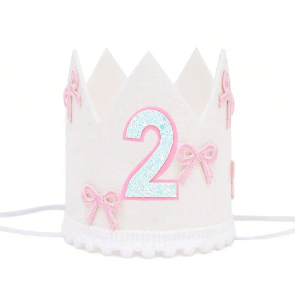 White birthday crown with pink number '2' and bows on a white background