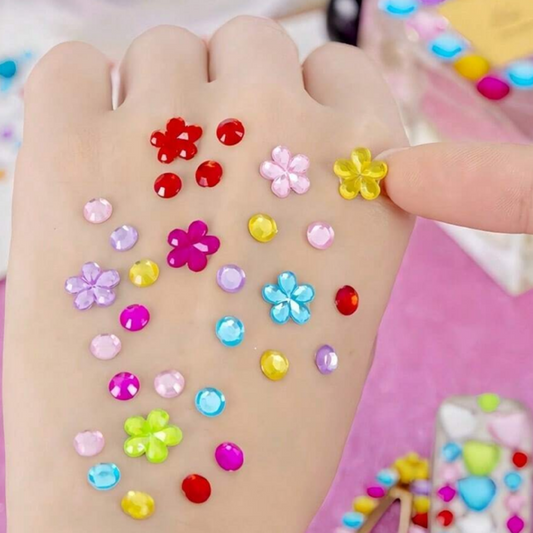 Colorful flower-shaped stickers on a child's hand
