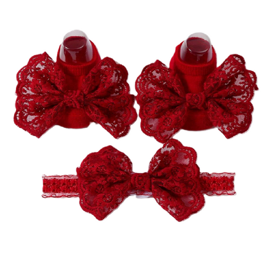 Set of red lace hair bows with a headband on a white background