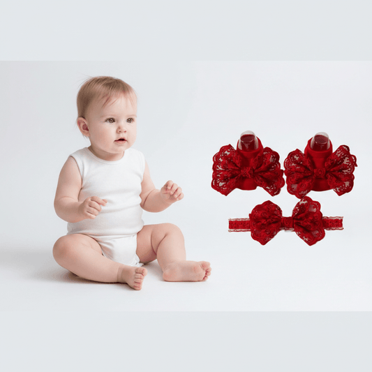 Red lace bow hair clips on a white background