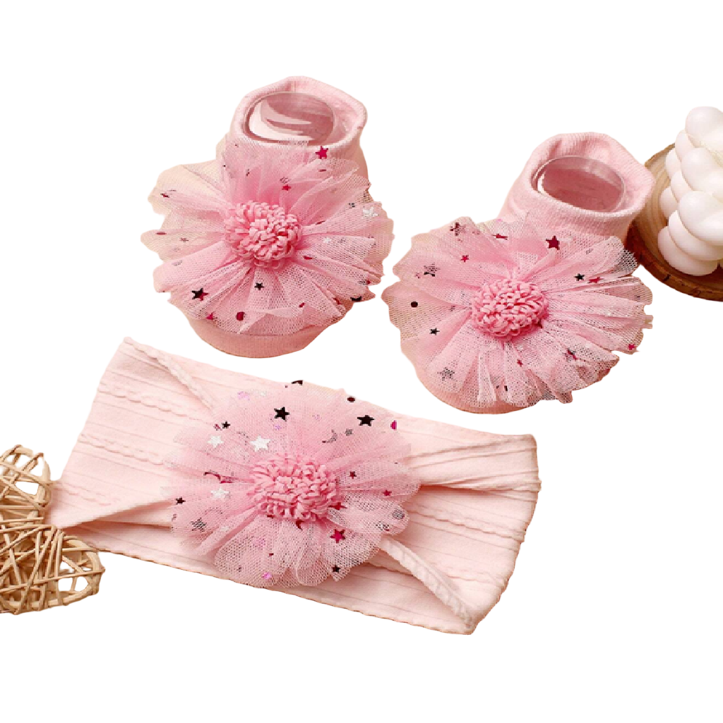 Pink baby booties and headband with floral details