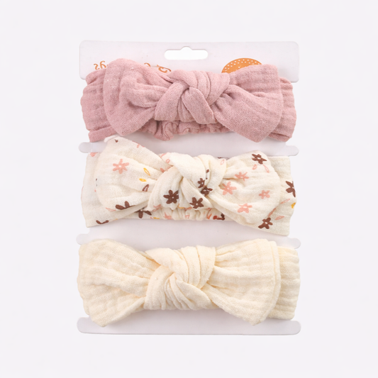 Set of three floral headbands on a white background