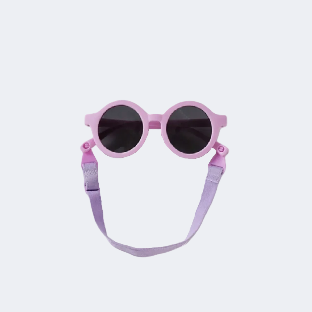 Pink sunglasses with a strap on a white background