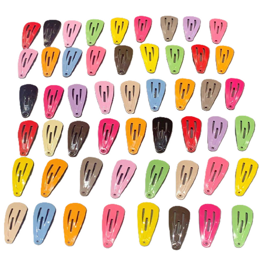 Assorted colorful hair clips arranged in a grid on a white background