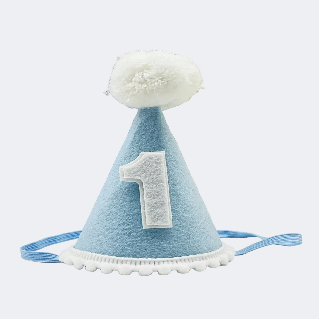 Blue birthday hat with white number '1' against a colorful background