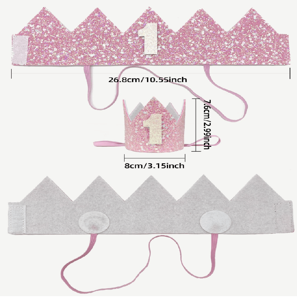Pink glittery birthday crown with number '1' on a light gray background