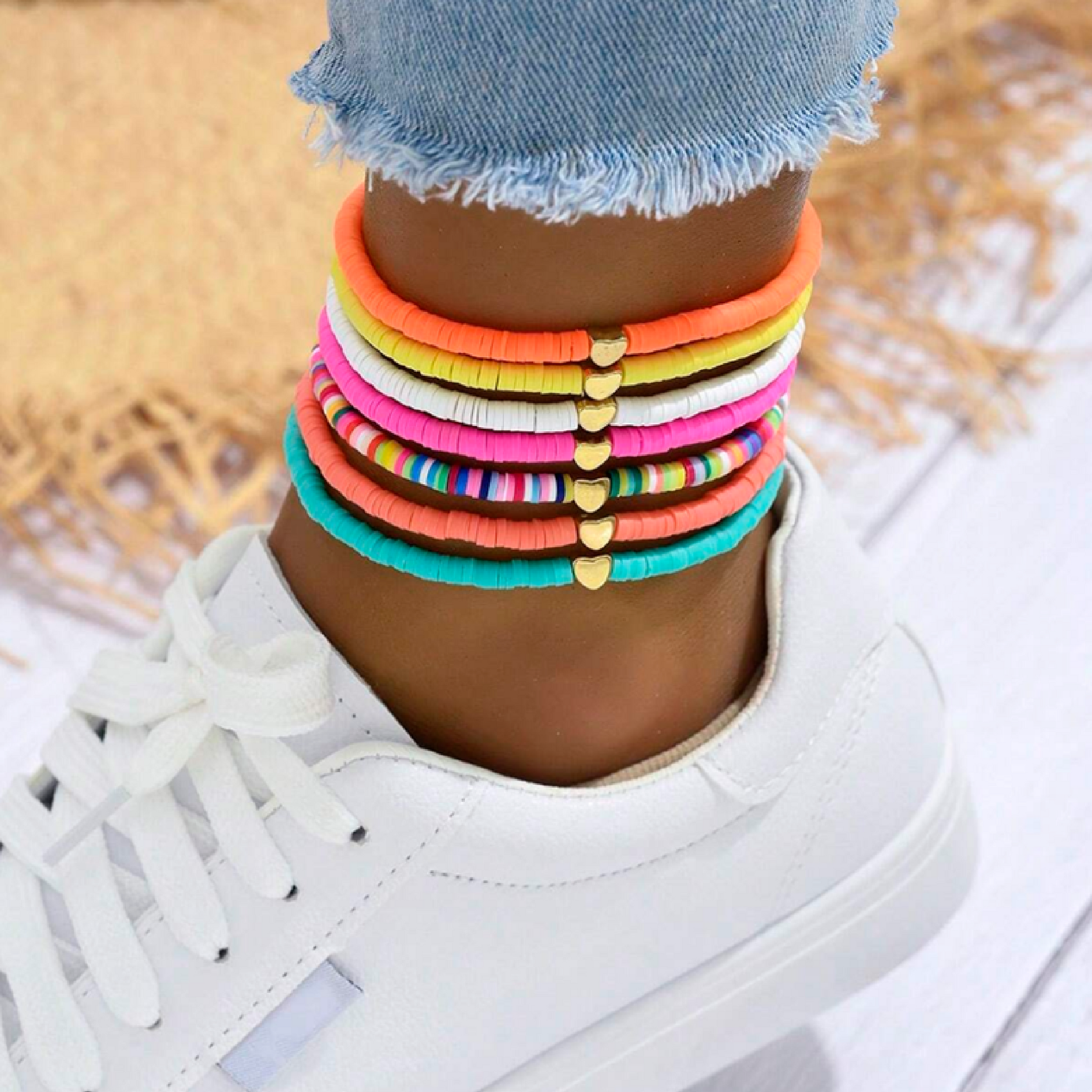 Colorful bracelets on a person's wrist
